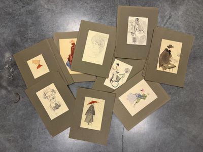 beaucoup de cartes illustrées posées sur une table