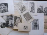 a lot of old pictures on the table together