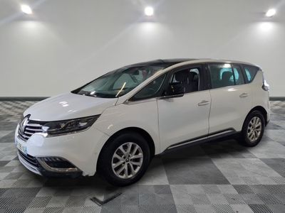 the white van is parked on a checkered tile floor