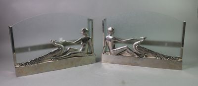 pair of art deco bookends in the shape of a woman and a man