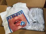 a box with a t - shirt and a t - shirt with a picture on it
