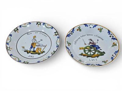two plates with a picture of a man and a woman on them