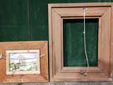 a picture of a picture hanging on a wall next to a picture frame