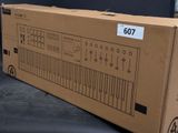 a cardboard box that has a keyboard on top of it