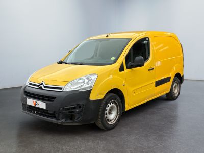 yellow citrole van parked in a white room with a black floor