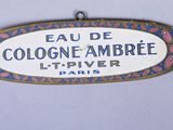a sign on the wall that says eau de cologne ambre