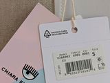 a tag that says charba ferragnii on the back of a jacket