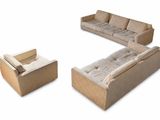 un canapé, un fauteuil, un pouf et un pouf en forme de zigzag