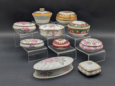 many bowls and trays that are sitting on a table