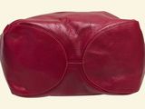 red leather toiletry bag on a white background