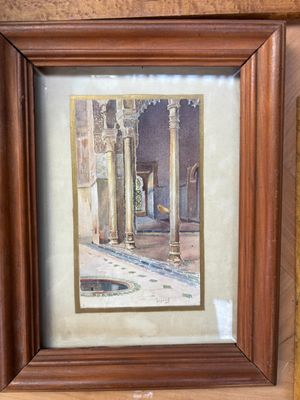 tableau encadré représentant une cour avec des colonnes et une fontaine