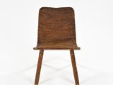 chair made of wood with bent legs and a seat made of wood