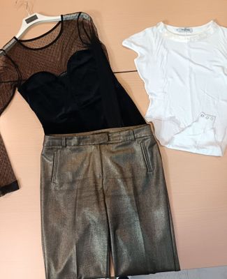 two pieces of clothing that are sitting on a table