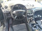 a picture of a car dashboard with a steering wheel