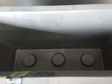 an image of a close up of a stove with four knobs