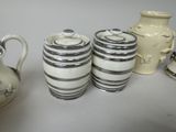 three vases that are sitting next to each other on a table