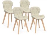 four chairs with wooden legs and a white upholstered seat