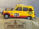 a toy car that is on display in a glass case