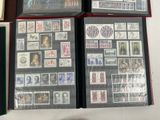a lot of stamps on the pages of a book
