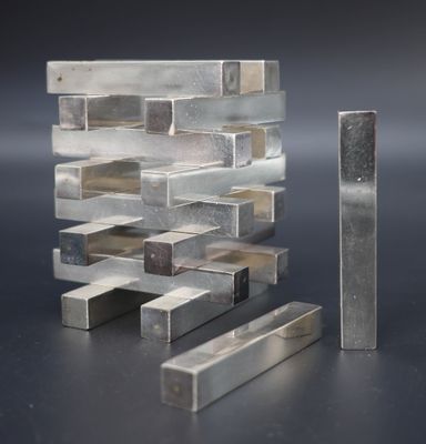 several pieces of metal are stacked on top of each other