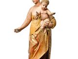 l'image d'une statue représentant une femme tenant un enfant dans ses bras