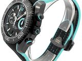 the watch is black and blue with a blue band