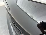 a close up of a car ' s emblem on the hood