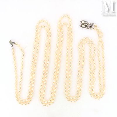 three pearl necklaces with a clasp and clasp