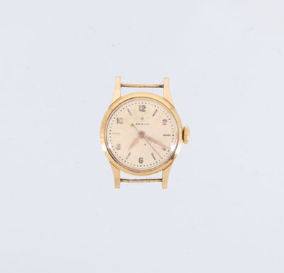 une montre en or avec un cadran blanc sur fond bleu
