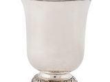 a silver cup on a pedestal on a white background