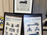 three framed pictures of different types of cars on the floor