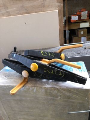 two pairs of scissors on top of a box