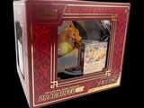 a box with a figurine of a dog inside of it