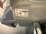 a close up of a machine with a sticker on it