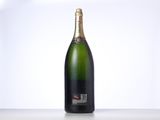 a close up of a bottle of champagne on a table