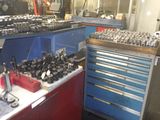 a picture of a workshop with many tools on the counter