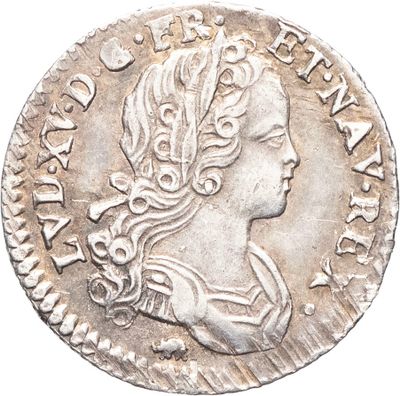 une pièce en argent avec l'image d'une femme de profil