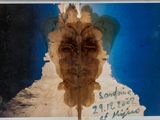 a picture of a picture of a face on a piece of paper