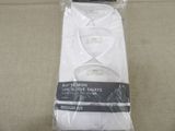 two pairs of men ' s white dress shirts wrapped in plastic