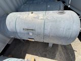a large metal tank that is sitting in the back of a truck