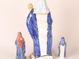three figurines of the virgin mary and child jesus