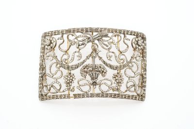 a white gold and diamond cuff bracelet