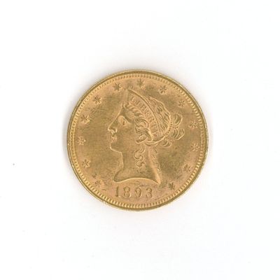 une image d'une pièce d'or sur une surface blanche