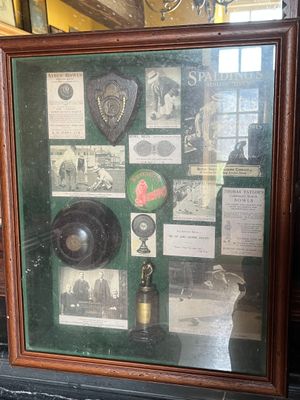 a picture of a framed picture with many items on it