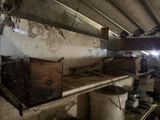 a room with a lot of stuff on the shelves