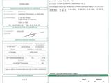 a close up of a document with a barcode on it