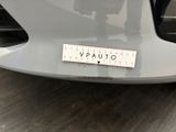 a close up of a car with a sticker on it ' s bumper
