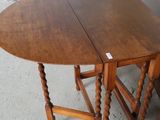 a wooden table with a small table top on it