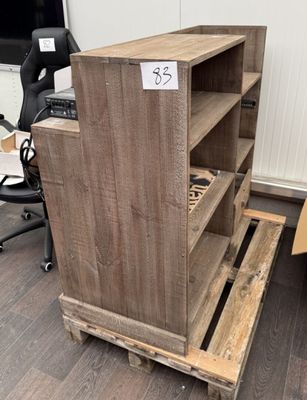 a wooden shelf that has been made out of pallets