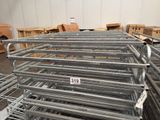 a lot of metal racks in a warehouse with boxes